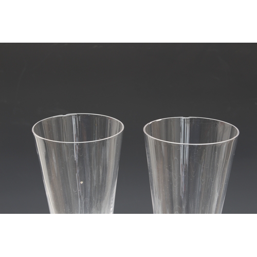 147 - A set of five unusual oversized blown glass champagne flutes, probably third quarter 20th century, o... 