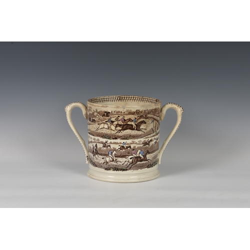 10 - A 19th century twin handled loving cup of large proportions, transfer printed and hand coloured, dep... 