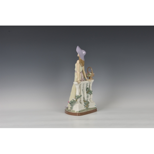 103 - A large Lladro figurine 'Time for Reflection', young lady modelled standing, leaning against balustr... 