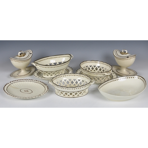 105 - A 19th century Wedgwood style creamware part dessert service, comprising a navette shaped dish,10 5/... 