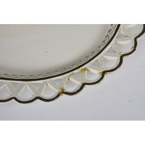 105 - A 19th century Wedgwood style creamware part dessert service, comprising a navette shaped dish,10 5/... 