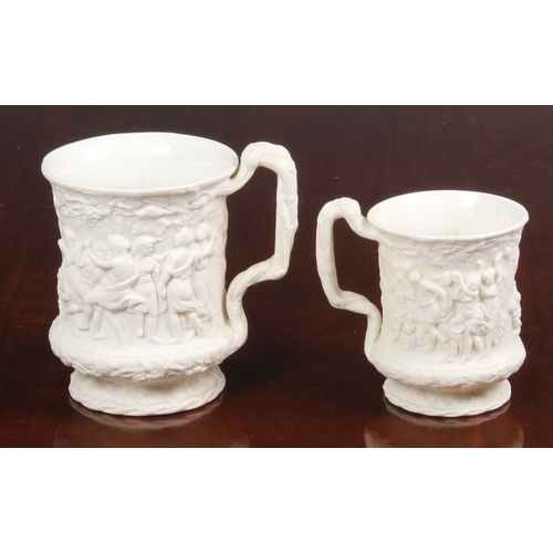 109 - Charles Meigh - two white porcelain tankards with vine handles	, 19th century, bisque glaze to ex... 