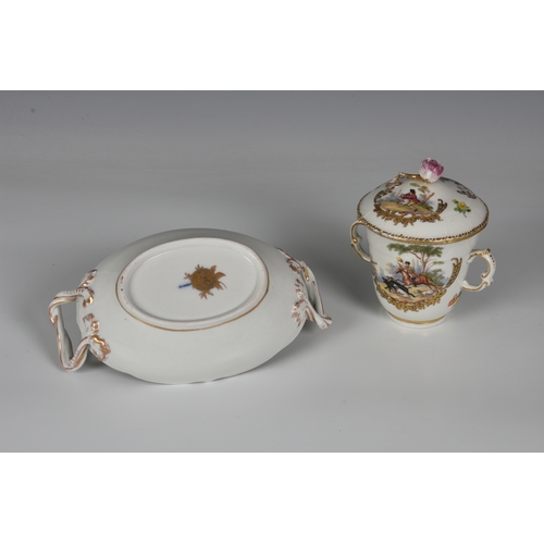 112 - A Berlin porcelain two-handled chocolate cup and cover, finely painted with two scenes in gilded hal... 