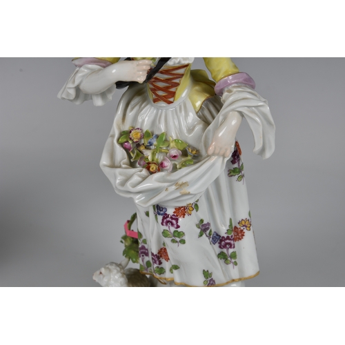 118 - A pair of Meissen figures of a gallant and his companion, early 20th century, the man holding a bask... 