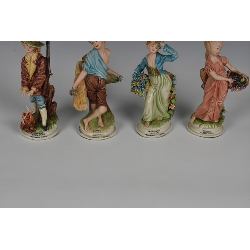 119 - A set of four Capodimonte porcelain 'Four Seasons' figures, by Tiziano Galli, the tallest 7¼in. (18.... 