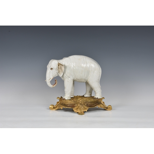 12 - An ormolu mounted Sampson white porcelain elephant , after Meissen, 19th century, realistic features... 