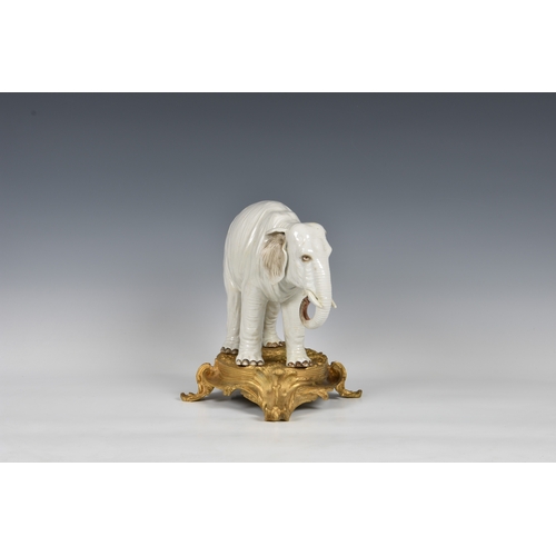 12 - An ormolu mounted Sampson white porcelain elephant , after Meissen, 19th century, realistic features... 