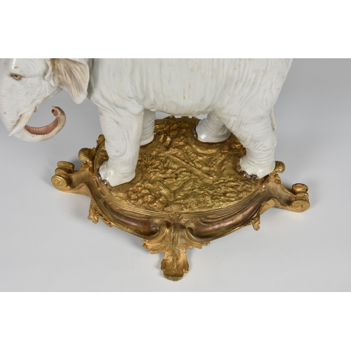 12 - An ormolu mounted Sampson white porcelain elephant , after Meissen, 19th century, realistic features... 