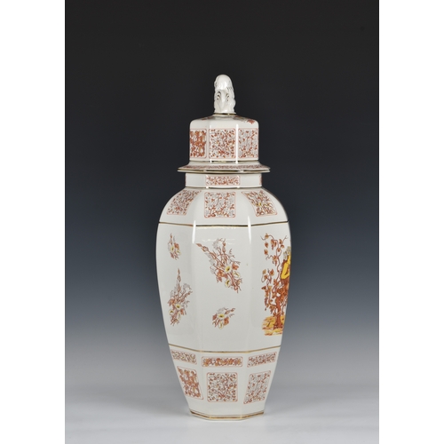 121 - A octagonal floor vase and cover, the central decoration depicting two ladies amidst grapevine, and ... 