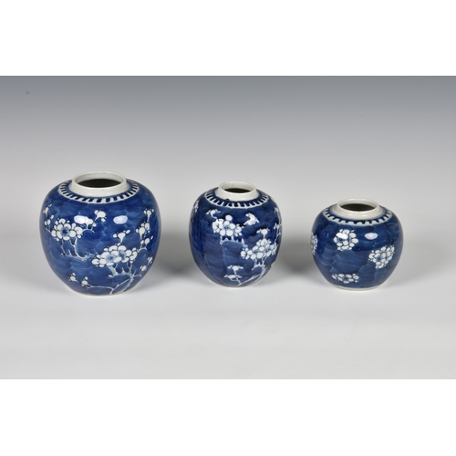 1256 - A small group of Chinese porcelain covered jars, 20th century, comprising a famille rose ovoid vase ... 