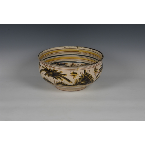 13 - A large Talavera or Puente del Arzobispo Spanish majolica bowl, probably early 18th century, the wel... 