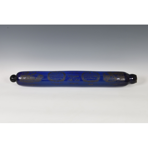 143 - An early 19th century unusually large 'Mariners' Bristol glass cobalt blue rolling pin, gilt transfe... 