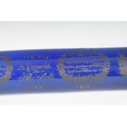 143 - An early 19th century unusually large 'Mariners' Bristol glass cobalt blue rolling pin, gilt transfe... 