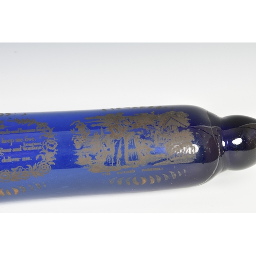 143 - An early 19th century unusually large 'Mariners' Bristol glass cobalt blue rolling pin, gilt transfe... 