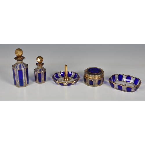 159 - A late Victorian five piece blue and gold glass dressing table set, comprising of two perfume bottle... 