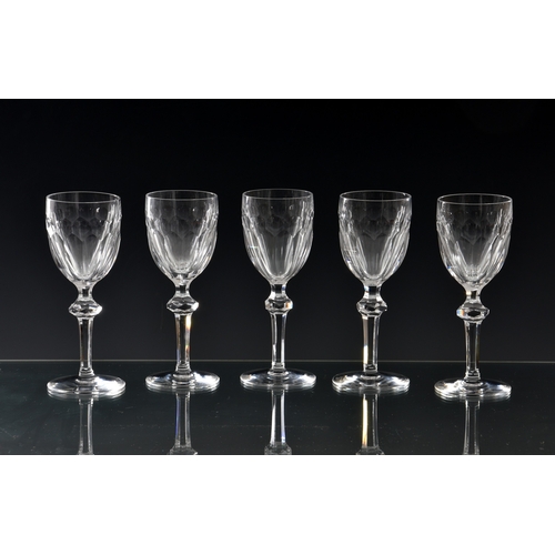 166 - A set of twenty-one Waterford Curraghmore pattern port or sherry glasses, 5 7/8in. (14.9cm.) high, e... 