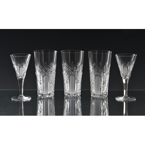 167 - A set of six mid-century cut glass sherry glasses, the drawn, trumpet bowls with blaze, star and hob... 