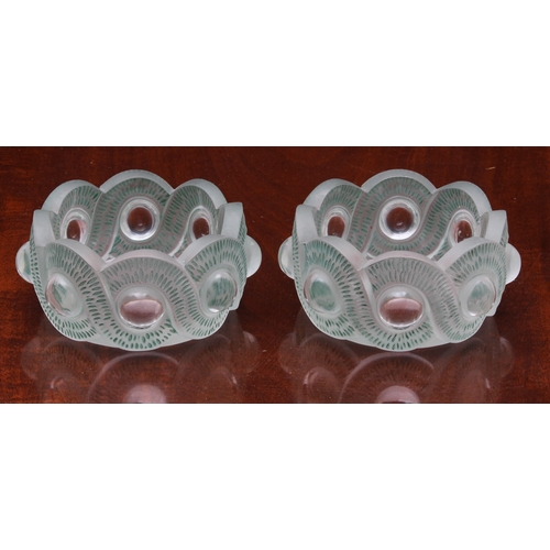 176 - A pair of Lalique 'Gao' finger bowls, the bodies with entwined frosted strapwork with blue/green hig... 