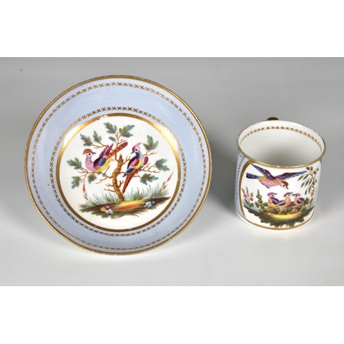 18 - A Spode porcelain coffee can and saucer, early 19th century, with painted reserves of exotic birds, ... 