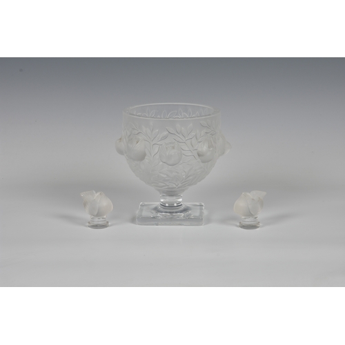 180 - A Lalique frosted glass goblet form vase with a band of raised sparrows among foliage, Created in 19... 