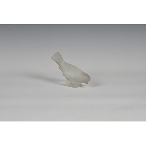 181 - A Lalique frosted glass sparrow, standing and feeding, engraved under base 4 7/8 x 3 5/8in. (12.3 x ... 