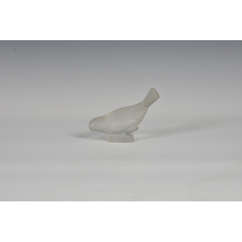 181 - A Lalique frosted glass sparrow, standing and feeding, engraved under base 4 7/8 x 3 5/8in. (12.3 x ... 