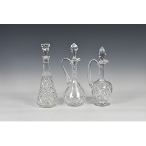 186 - A cut glass etched claret jug, having loop handle to diamond cut slender neck, the bulbous body etch... 