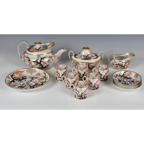 23 - A New Hall porcelain 'Imari Vine' pattern part tea service, early 19th century, pattern no. 446, com... 