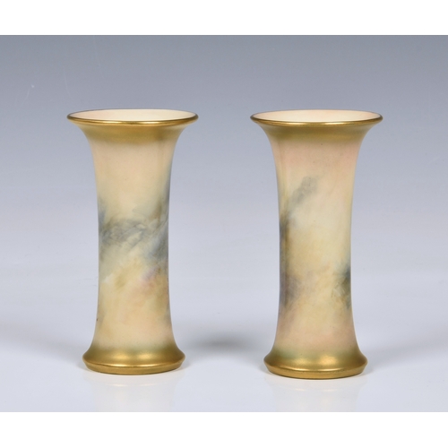 3 - A pair of Royal Worcester porcelain sheep painted trumpet spill vases by Harry Davis, each painted w... 