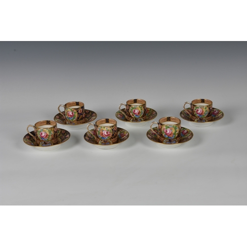 34 - A set of six Crown Staffordshire coffee cans & saucers, floral decorated with gilt highlights on cob... 