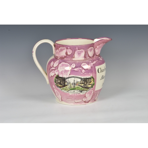 36 - A large early nineteenth century Sunderland pink lustre christening jug, painted and transfer printe... 