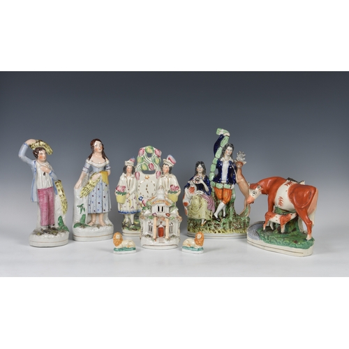 40 - A collection of Staffordshire Pottery flat back figures and others, of varying sizes and models, to ... 