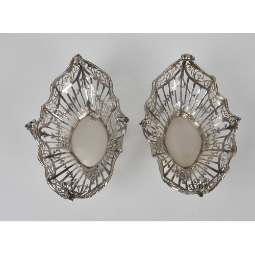 427 - A pair of Edwardian pierced silver bon-bon baskets, Josiah Williams & Co., London 1911, retailer's m... 