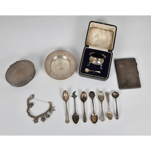 434 - A group of silver smalls, including a silver charm bracelet; a Birks (Canadian) oval engine turned j... 