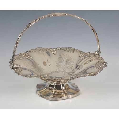 447 - A Victorian silver plated copper fruit basket, with applied fruiting vine border and pierced swing h... 