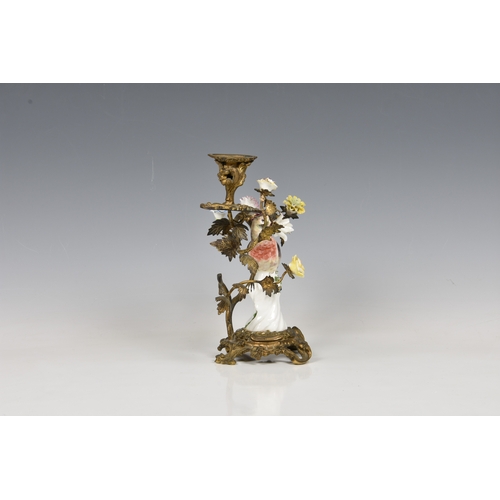 48 - A Samson porcelain ormolu-mounted bird candlestick, 19th century, composed of a porcelain bird stand... 