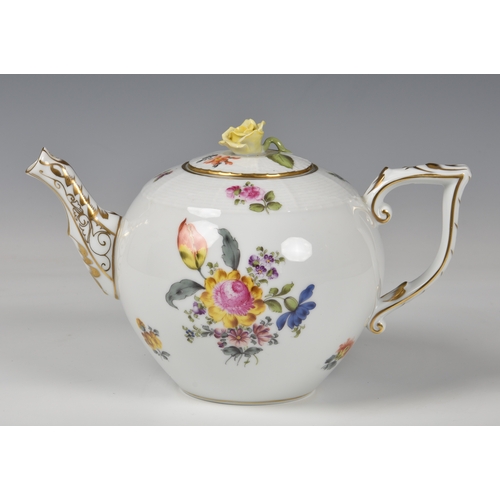 56 - A Herend Teapot, white glaze with hand painted floral design and gilded decoration to handle and spo... 