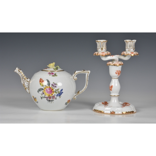 56 - A Herend Teapot, white glaze with hand painted floral design and gilded decoration to handle and spo... 