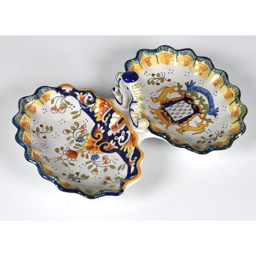 71 - A late 19th century St Malo faience two section crudité dish, with a scalloped edge, painted with th... 