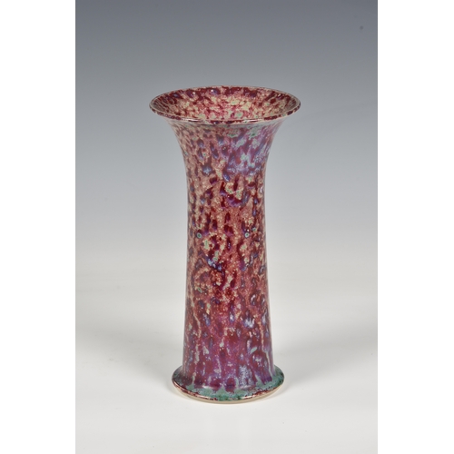 79 - A Ruskin Pottery high fired Lily Vase, 1925, stoneware, the glaze in mottled tones of grey, red and ... 