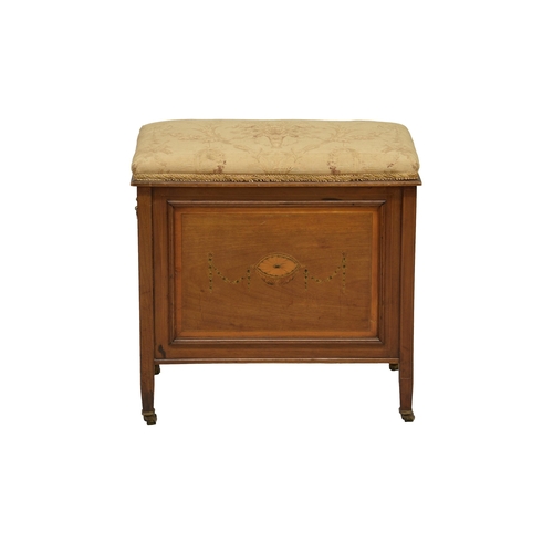 791 - An Edwardian mahogany piano stool, the stuff over seat lifting to a three compartment interior for m... 