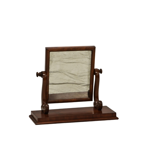 794 - A late Victorian mahogany toilet mirror, the rectangular mirror on a plain plinth base.