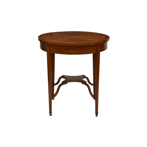 795 - A fine Edwardian mahogany and silkwood crossbanded occasional table, the circular top with central r... 