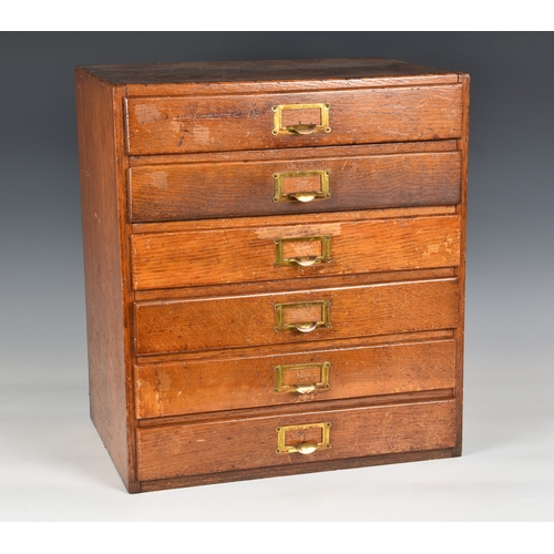 796 - A mid-century oak six drawer collectors or desk top chest, 1940s-50s, plain rectangular form, the dr... 