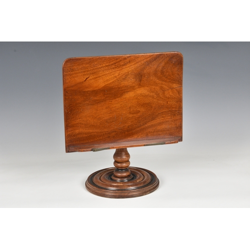 797 - A Victorian walnut adjustable table top book stand, the rectangular stand with brass page stays (one... 