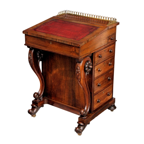 806 - An early Victorian rosewood Davenport, the top with gilt brass three quarter gallery over a gilt too... 