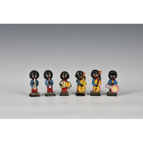 125 - Six Robinsons jam Golly musicians hand painted. (6) *One with large chip to base, other with litle n... 