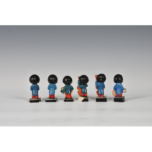 125 - Six Robinsons jam Golly musicians hand painted. (6) *One with large chip to base, other with litle n... 