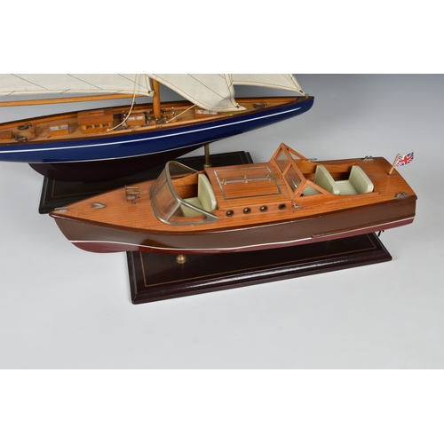 127 - Two wooden model boats late 20th century, comprising a mid-century style speedboat, 19½in. (49.5cm.)... 