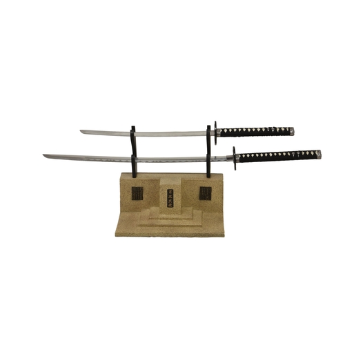 14 - Two modern Japanese Samurai swords (Katana / Tanto) on stand. steel blades.